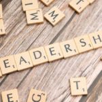 Mentorship - The word leadership spelled out in scrabble letters
