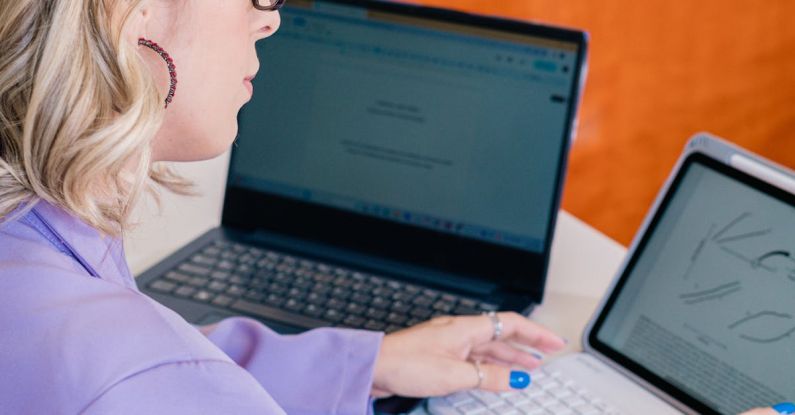 Professional Ethics - A woman in a purple shirt is using a laptop