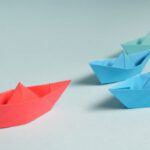 Ethical Leadership - Paper Boats on Solid Surface