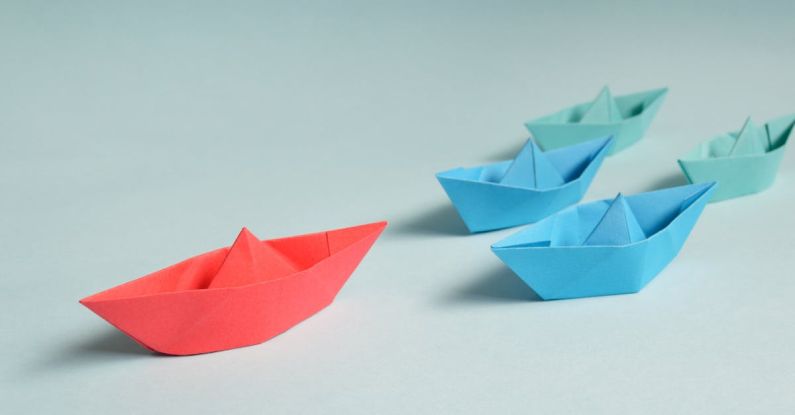 Ethical Leadership - Paper Boats on Solid Surface